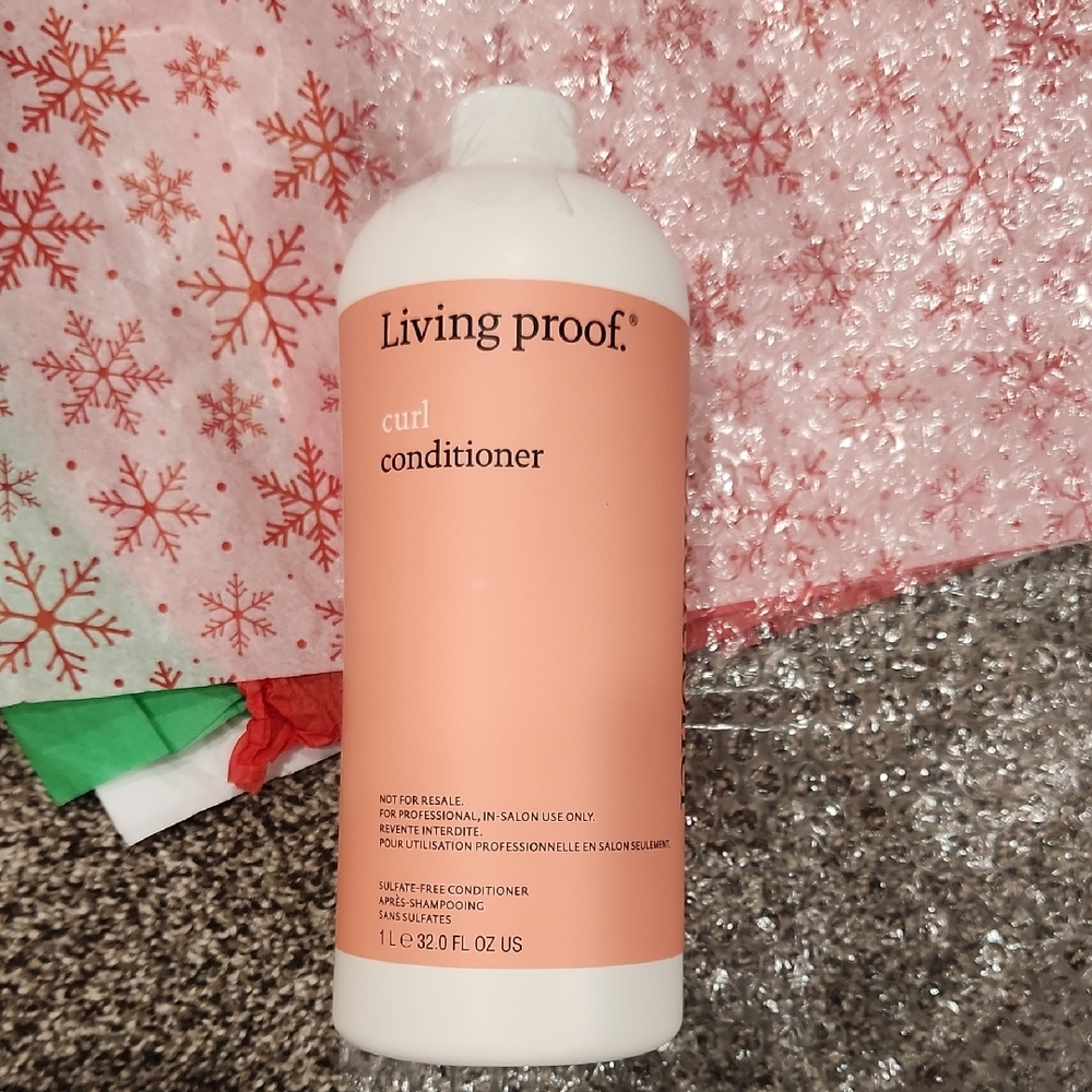 Living Proof Curl Conditioner in Peach and White